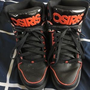 Osiris NYC 83 Black, red, white, zebra pattern.